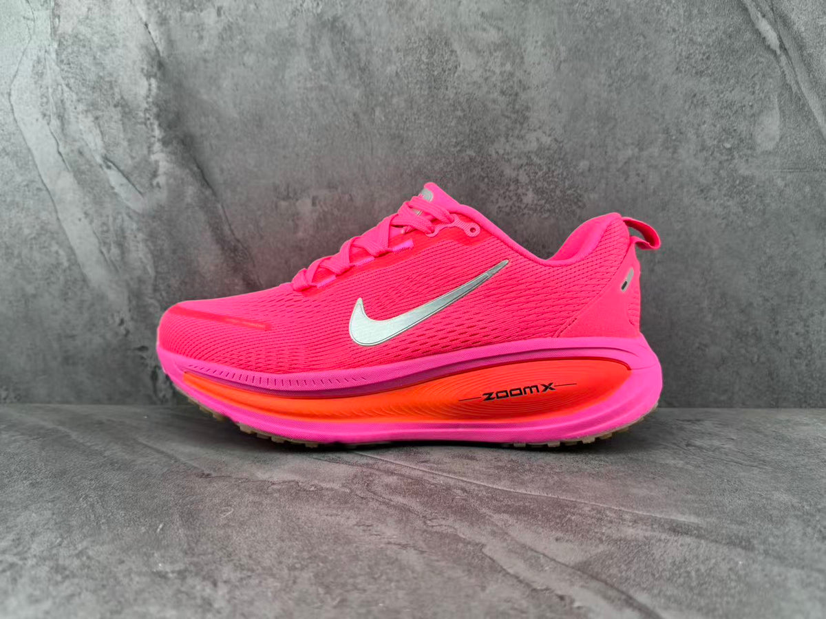 Nike ZoomX Running Shoes in Pink - product image from the listing.