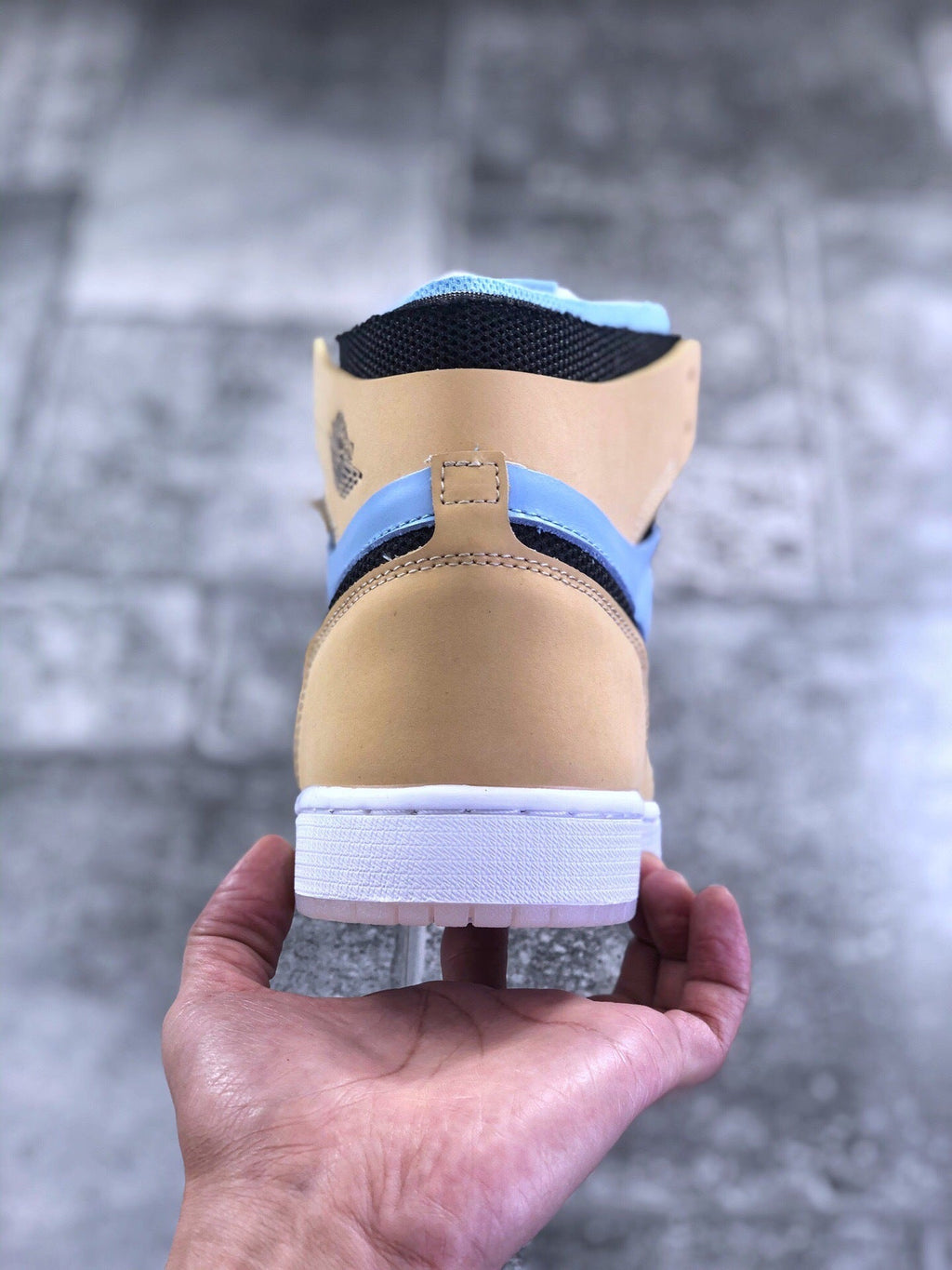 Air Jordan 1 Zoom CMFT Blue Tan Sneakers CT0979-400 - product image from the listing.