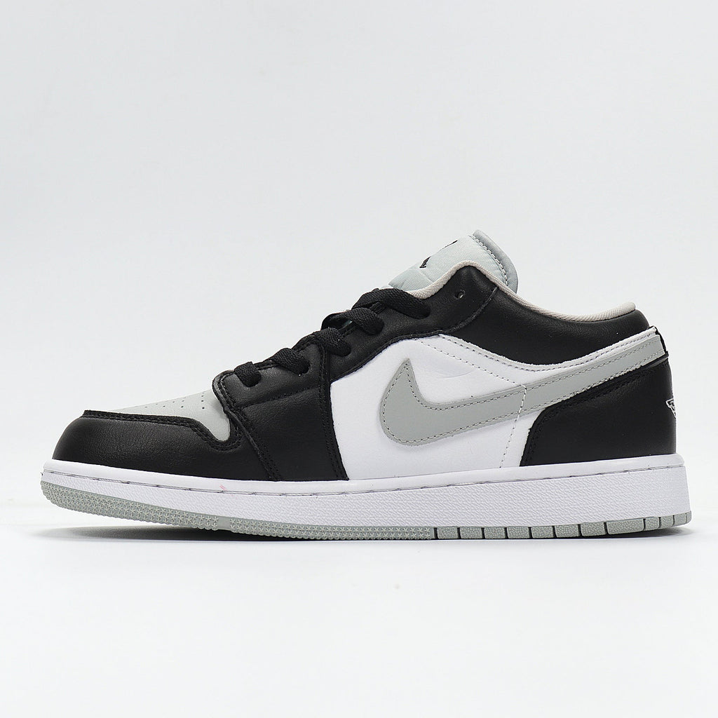 Jordan 1 Low Sneakers in Cool Grey 553560-039 - product image from the listing.