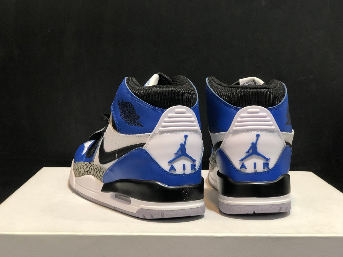 Jordan Legacy 312 High-Top Sneakers in White Blue AQ4160-104 - product image from the listing.
