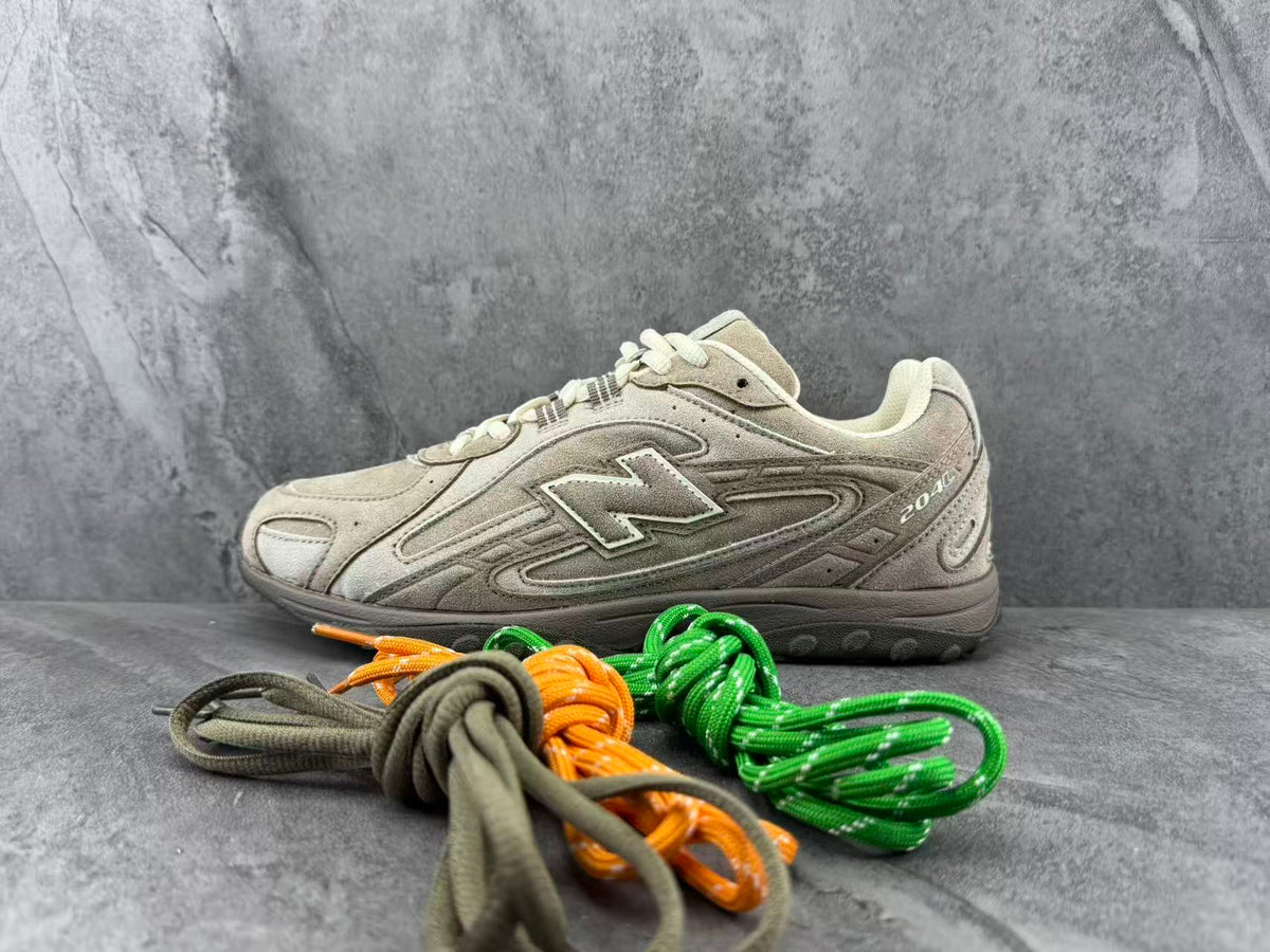 New Balance 204L Low-Top Sneakers in Taupe - product image from the listing.