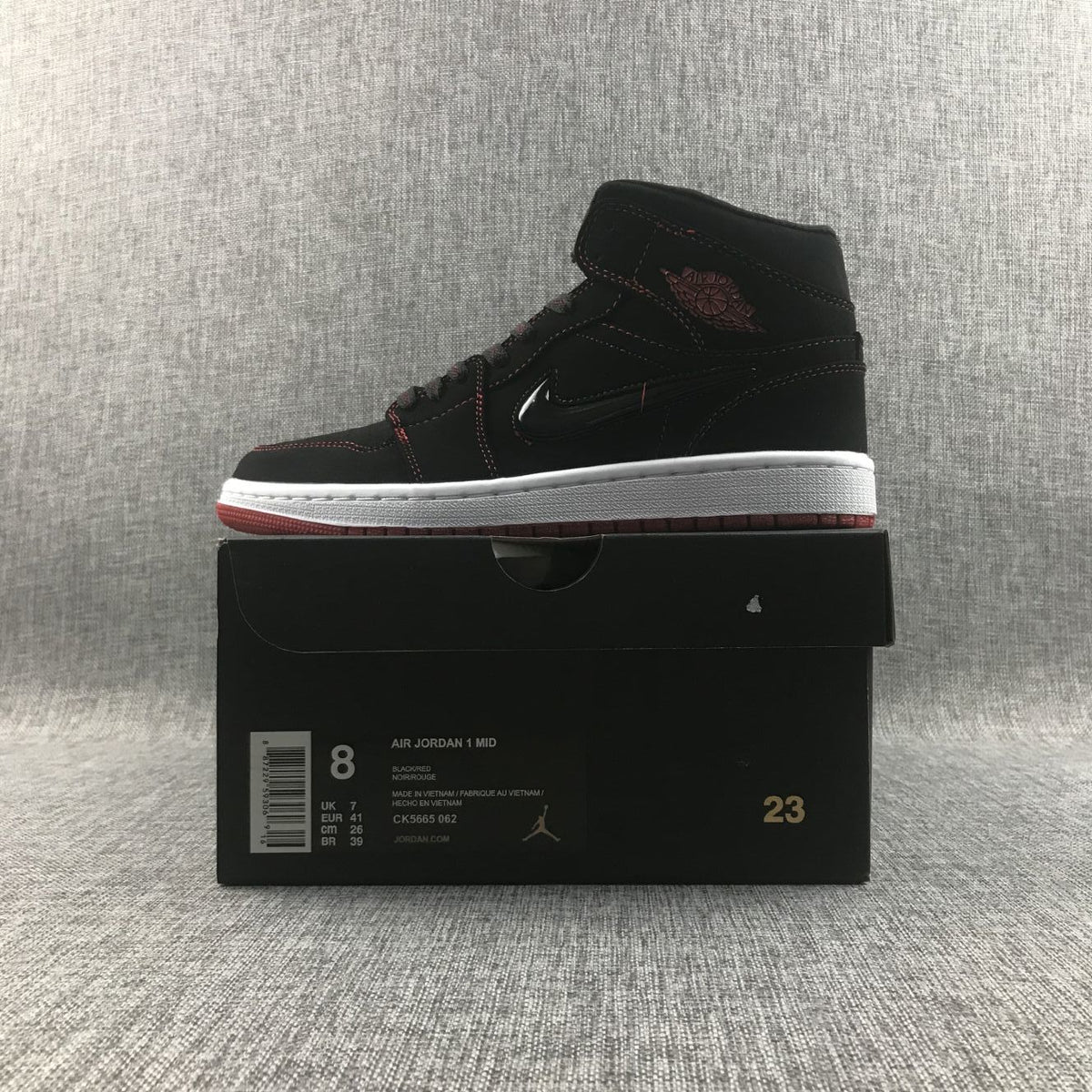 Air Jordan 1 Mid Sneakers Black Red CK5665-062 - product image from the listing.
