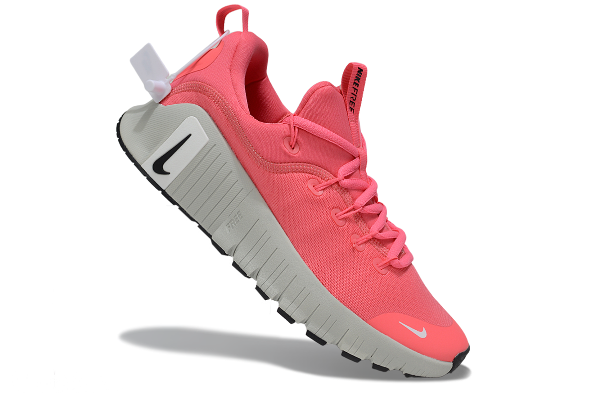 Coral Pink and Gray Nike Free Metcon 5 Sneakers - product image from the listing.