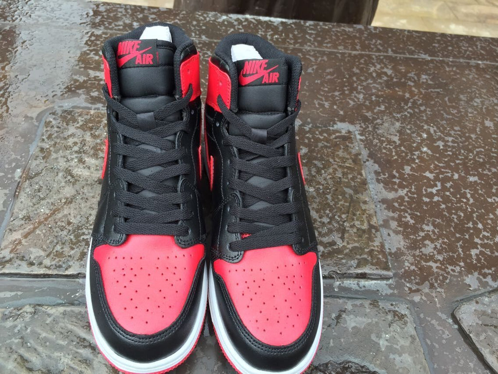 Air Jordan 1 High Sneakers in Black Red White - product image from the listing.