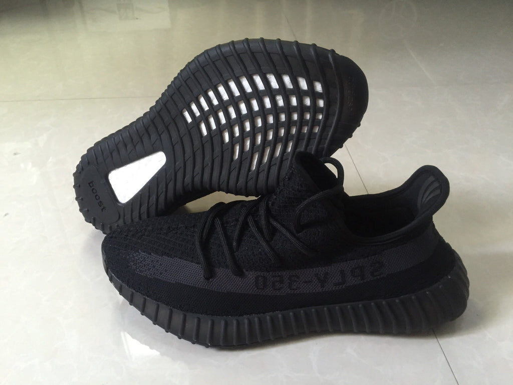 Adidas Yeezy Boost 350 V2 Sneakers in Black Knit - product image from the listing.