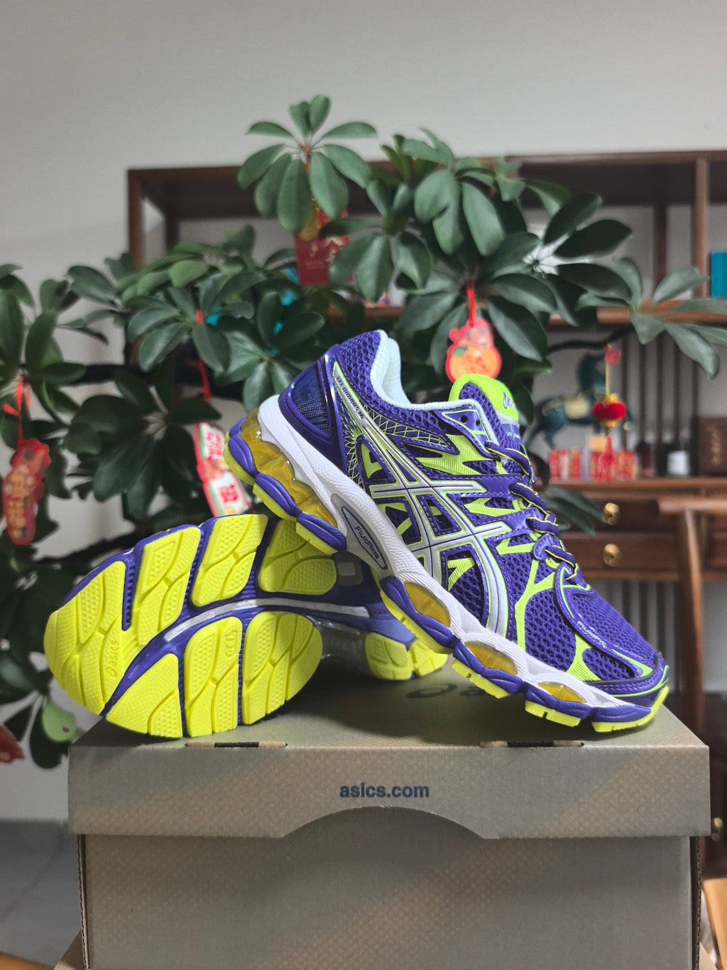 ASICS Gel-Nimbus 16 Sneakers in Purple Volt - product image from the listing.