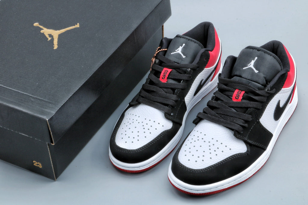 Jordan 1 Low Black Toe Sneakers in Black White Red - product image from the listing.
