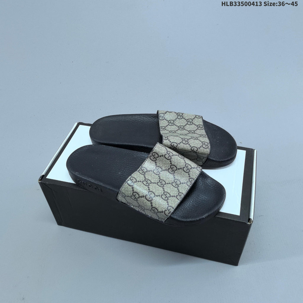 Floral Print Slide Sandals with Black Footbed by Gucci - product image from the listing.