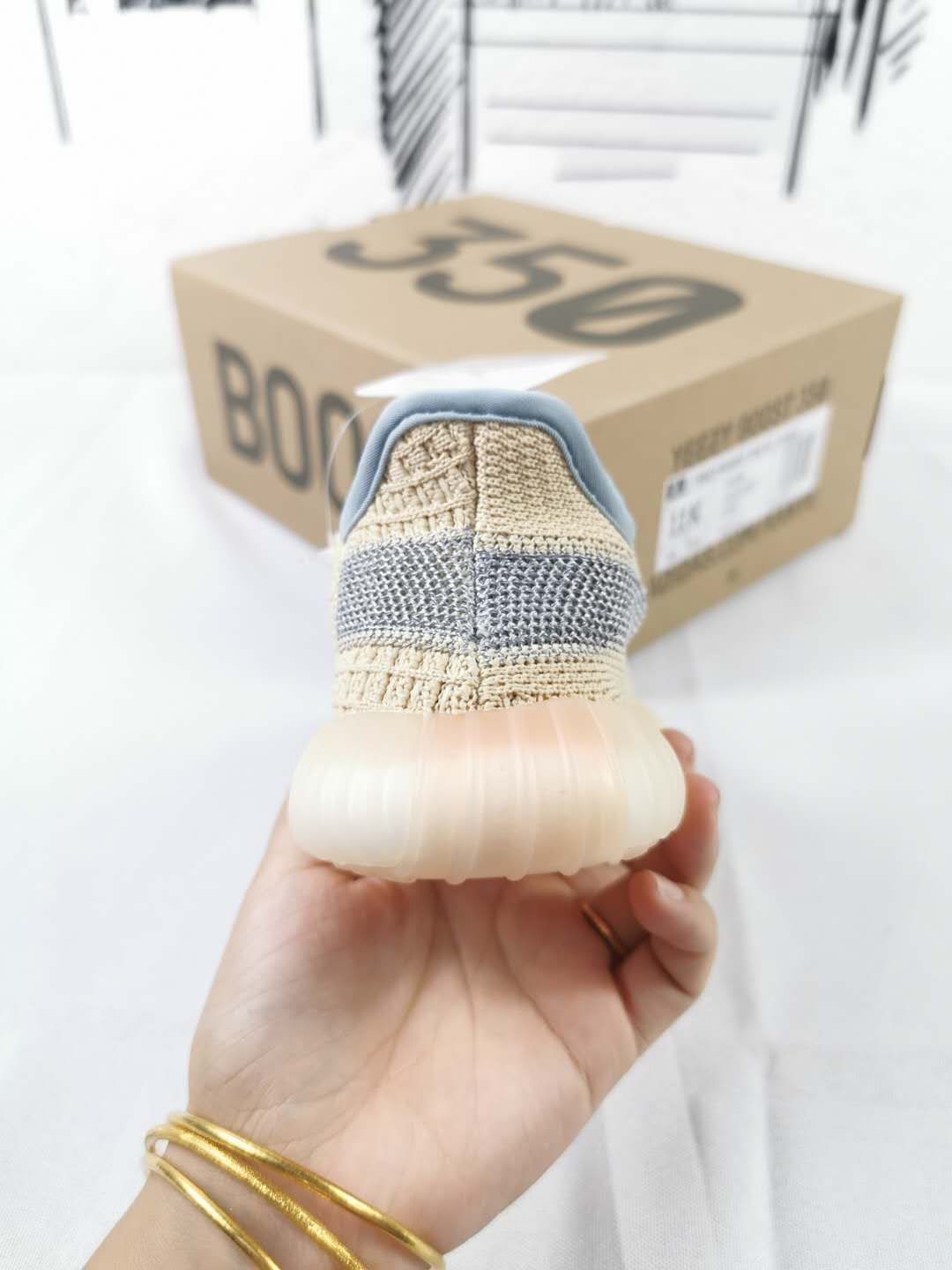 Yeezy 350 V2 Kids Sneakers in Linen in Yellow - product image from the listing.