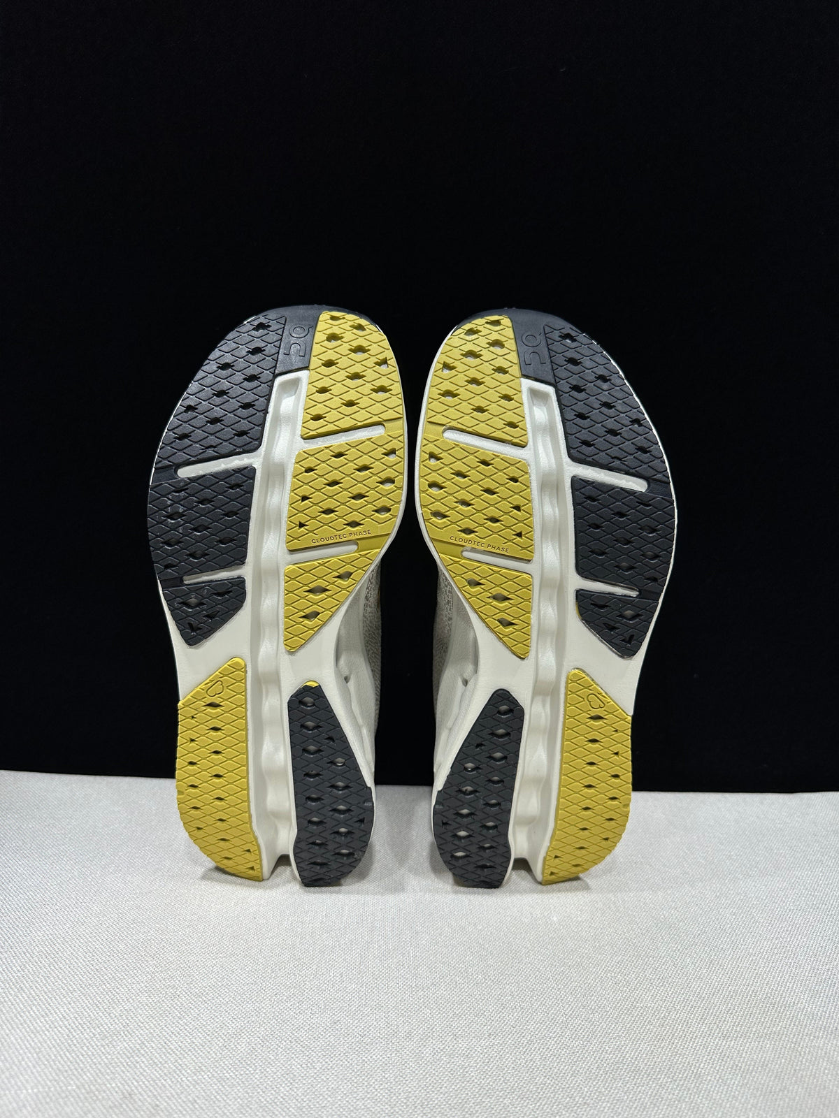 On Cloudsurfer Max Running Sneakers in Gray Beige - product image from the listing.