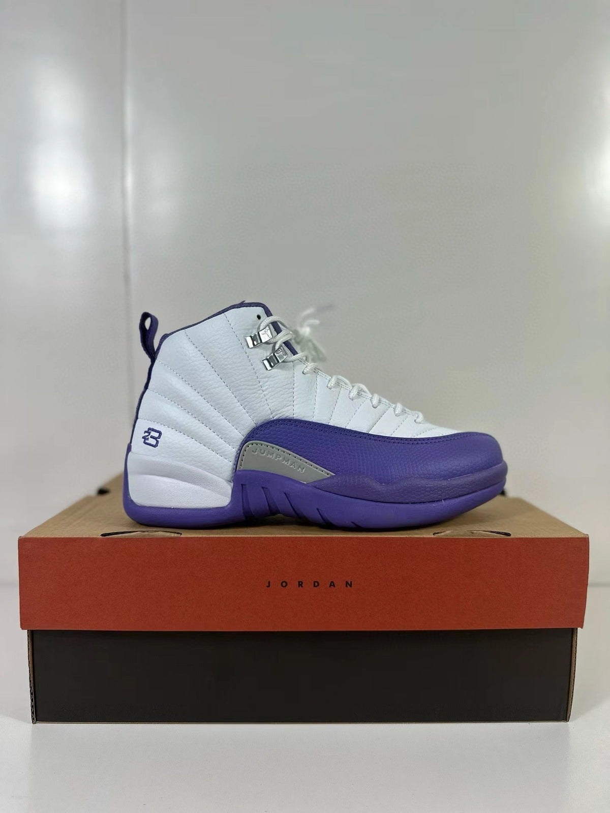 Air Jordan 12 Retro White Purple CT8013-150 Sneakers - product image from the listing.