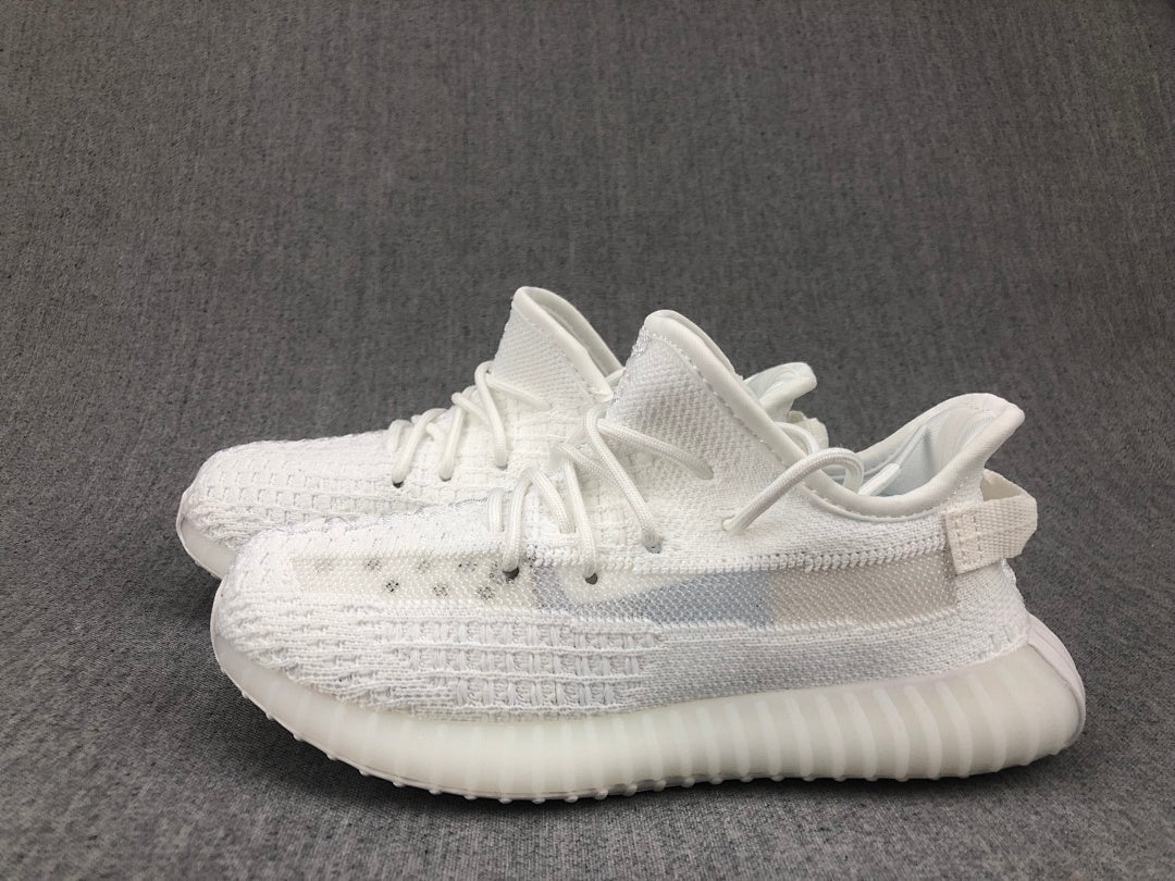 White Yeezy 350 V2 Kids Sneakers - product image from the listing.