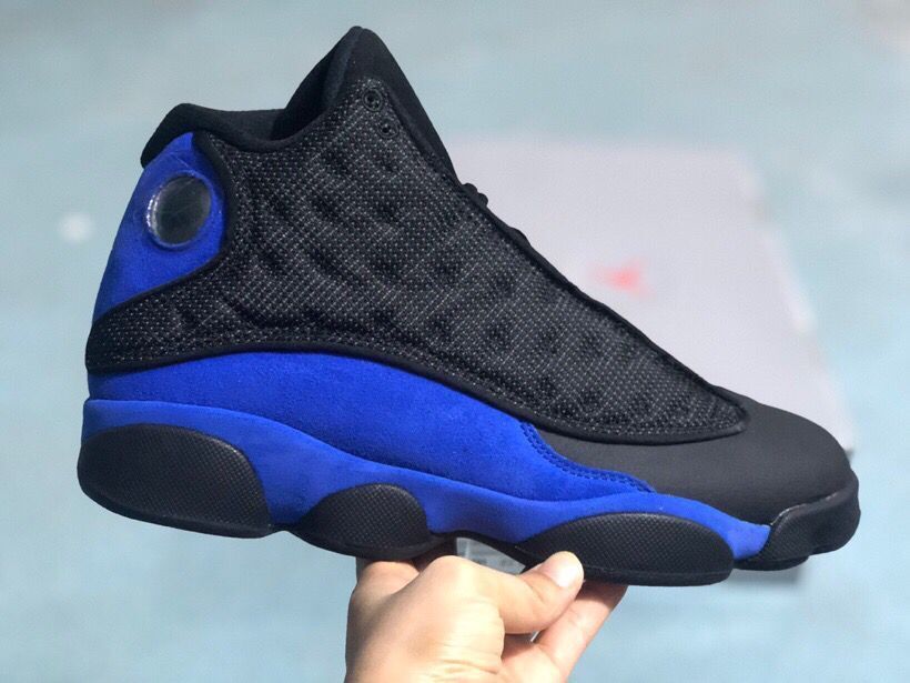 Jordan 13 Retro Sneakers Black/Royal in Blue - product image from the listing.