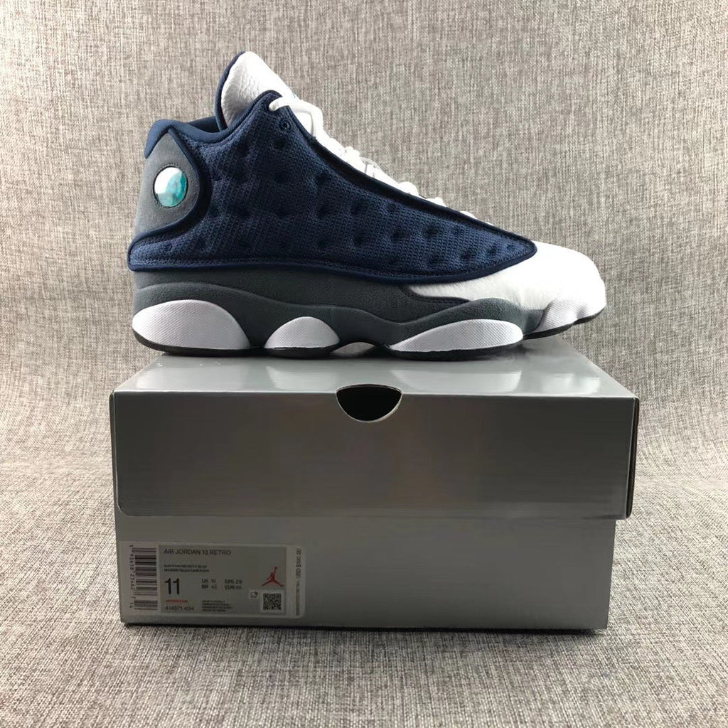 Air Jordan 13 Flint Navy Sneakers 414571-404 - product image from the listing.