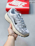 Nike Silver White Mesh Trainers - product image from the listing.