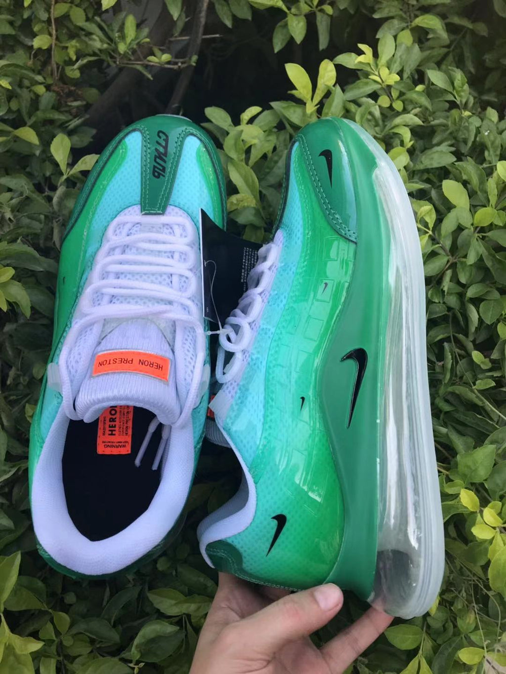 Nike Air Max 720 Sneakers in Green and White - product image from the listing.
