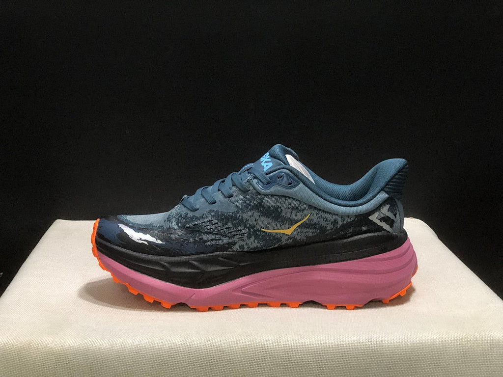 Blue and Orange HOKA Stinson 7 Trail Running Shoes - product image from the listing.
