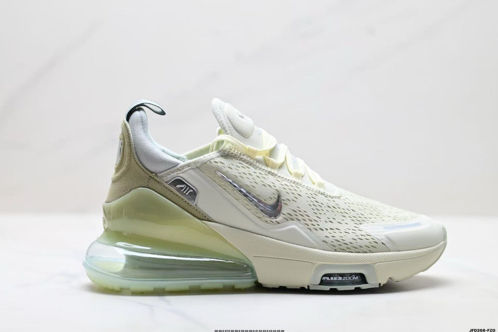 Light Green and White Nike Air Zoom Sneakers - product image from the listing.