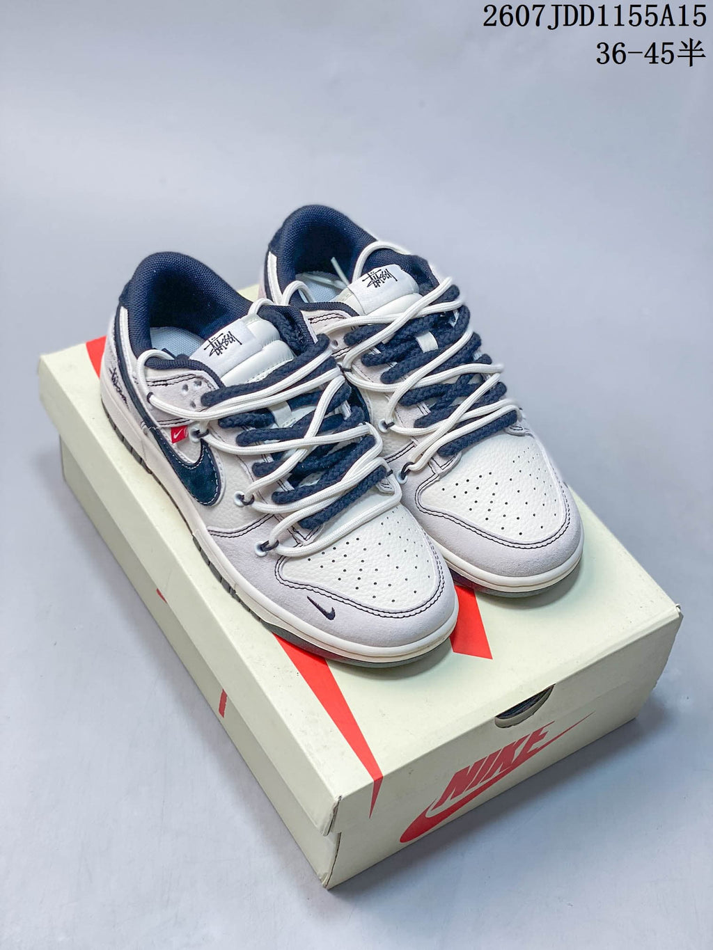 Nike SB Dunk Low Sneakers in Gray White Navy - product image from the listing.