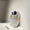 Nike Air Zoom Vomero 5 Running Shoes in White Grey Yellow - product image from the listing.