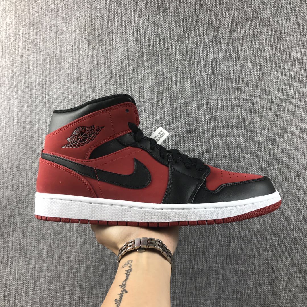Air Jordan 1 Mid Sneakers in Red, in Black and White - product image from the listing.