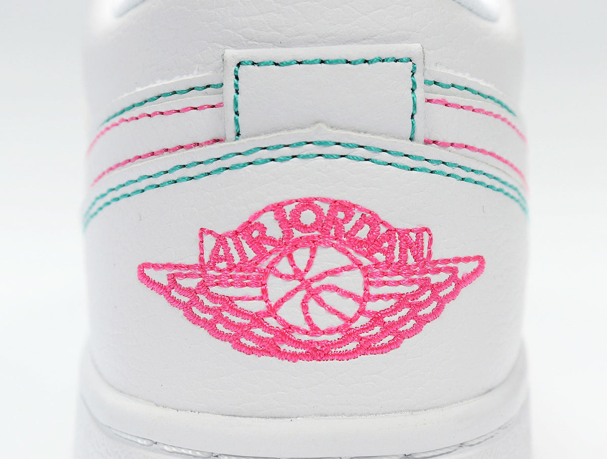 Nike Air Jordan 1 Low Sneakers in White Pink 554723-101 - product image from the listing.