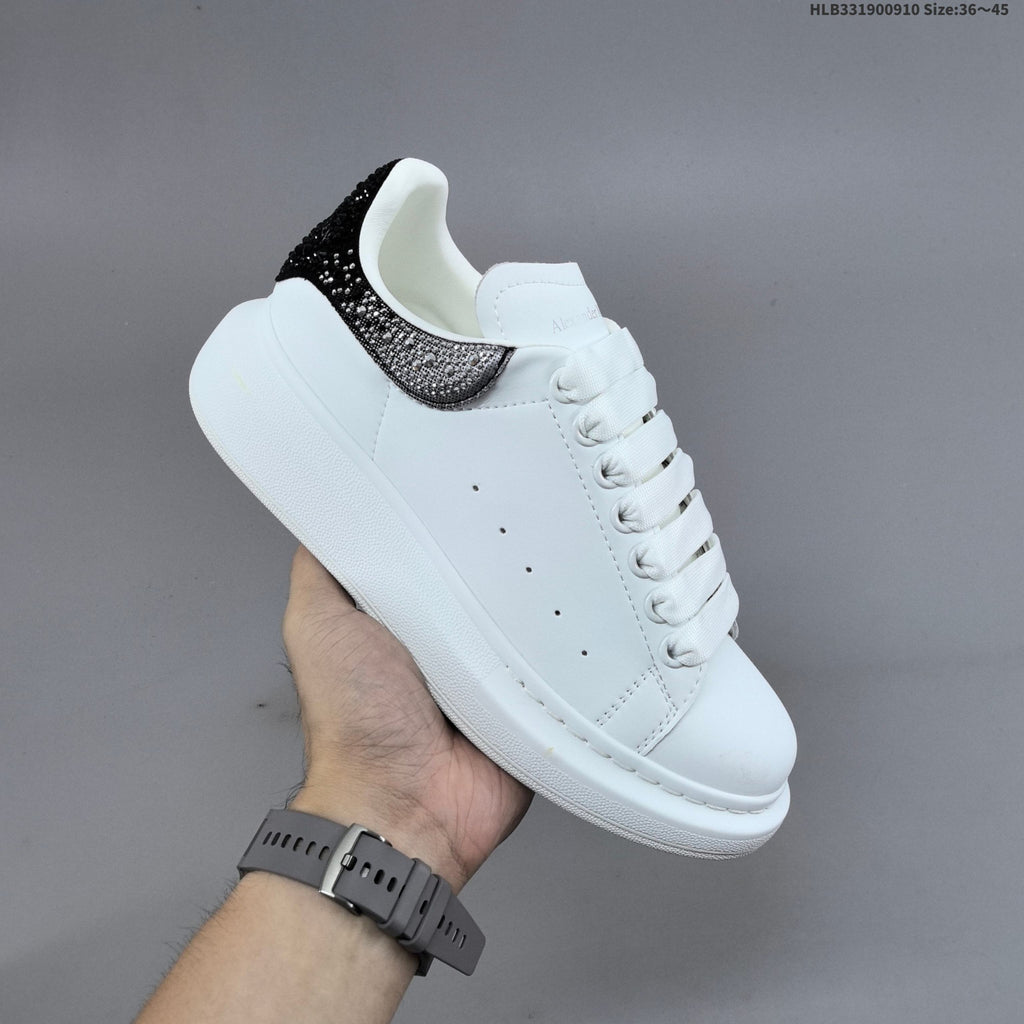 Alexander McQueen Oversized Low-Cut Sneakers with Crystal Heel - product image from the listing.