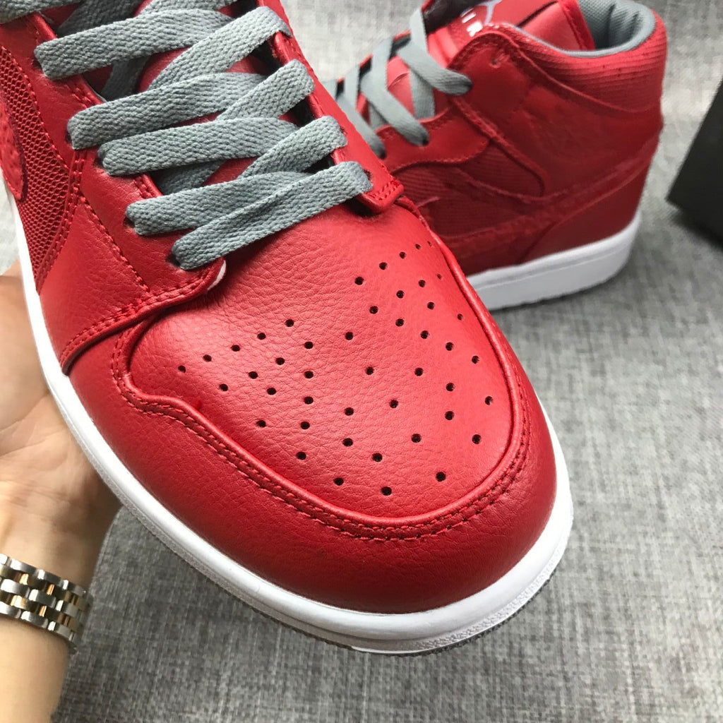 Red and Grey Jordan 1 Mid High-Top Sneakers - product image from the listing.