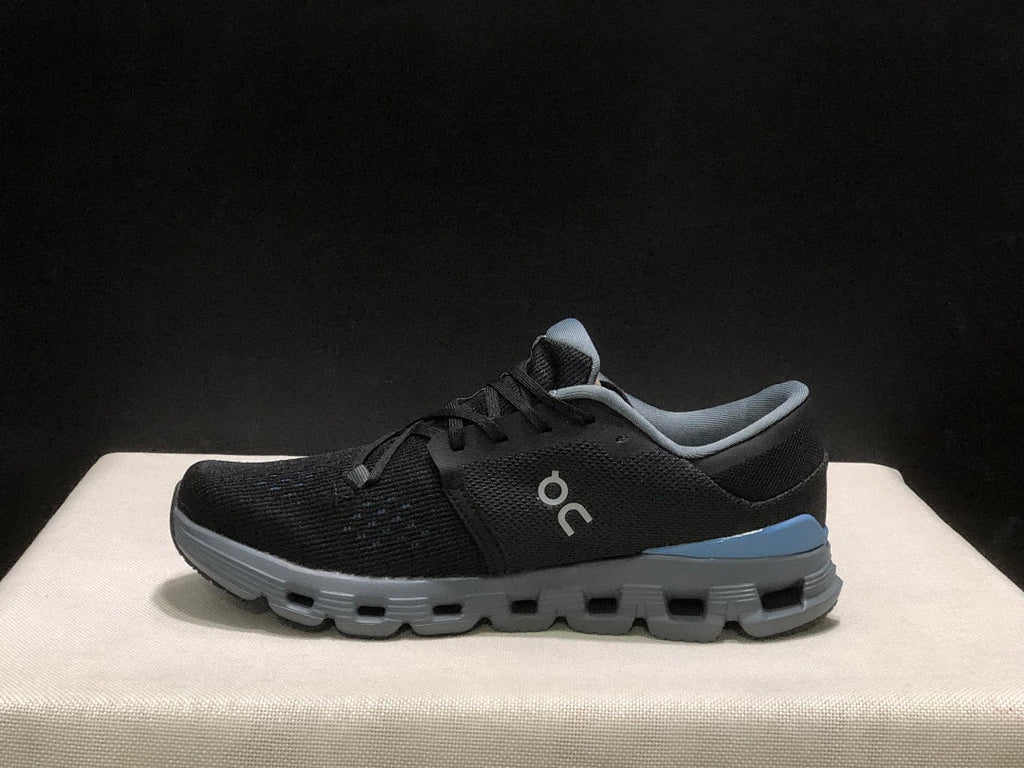 Black and Blue On Cloud X 4 Sneakers - product image from the listing.