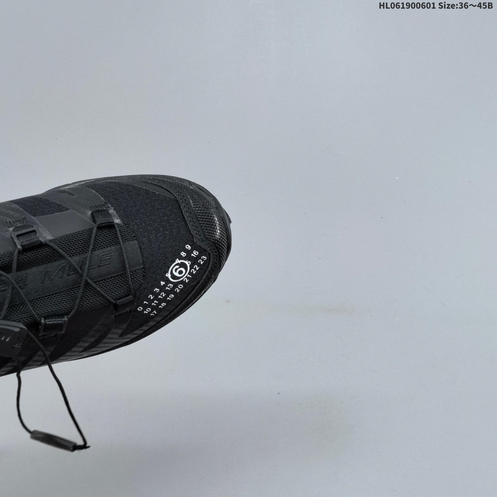 Black and Silver Salomon XT-4 Mule Sneakers - product image from the listing.