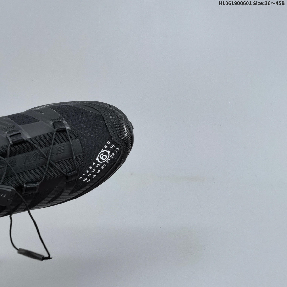 Black and Silver Salomon XT-4 Mule Sneakers - product image from the listing.