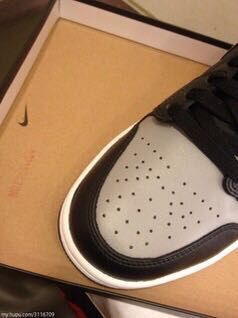 Jordan 1 High Sneakers in Grey Black - product image from the listing.