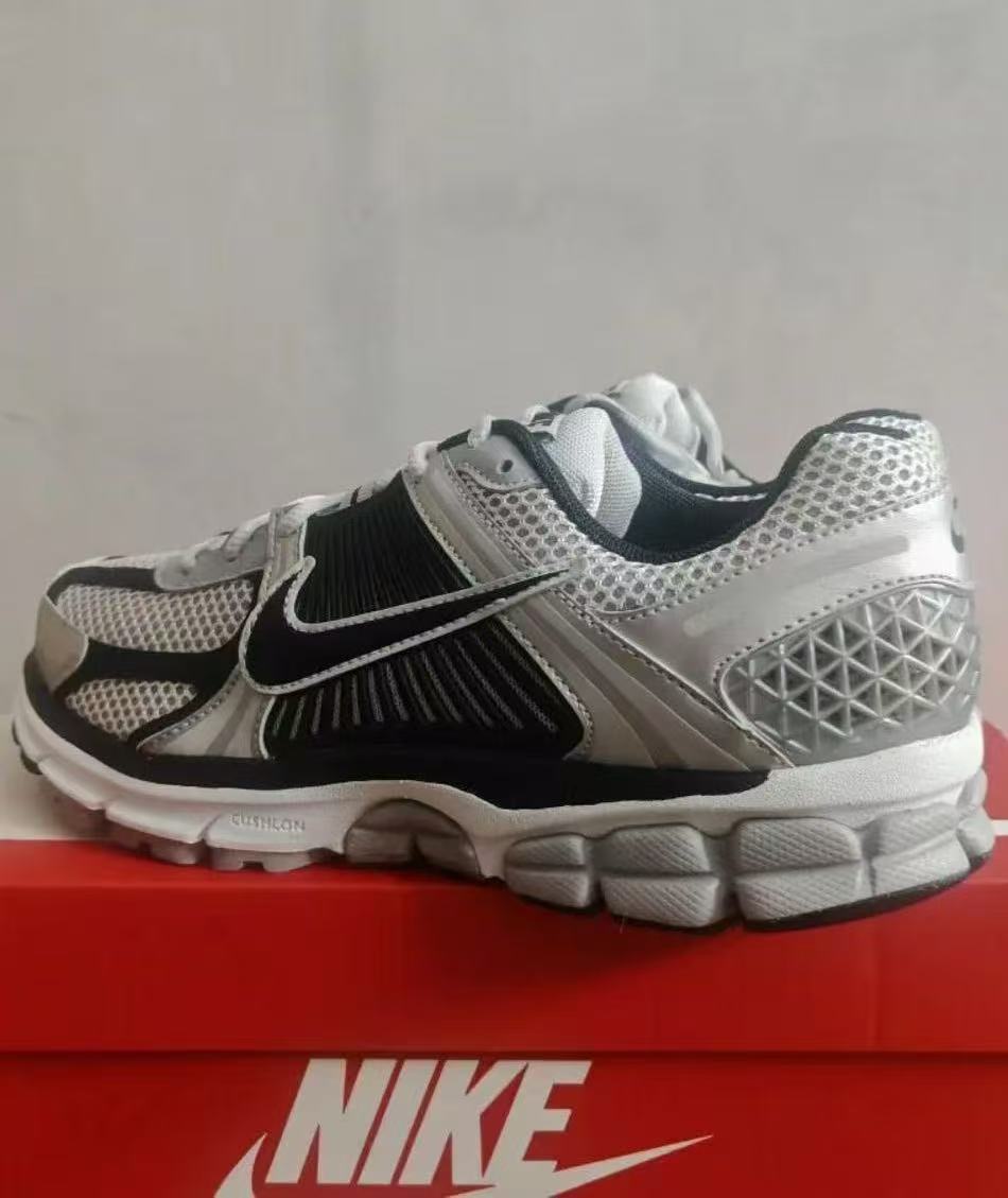 Nike Air Max 96 Sneakers in Silver Gray and Black - product image from the listing.