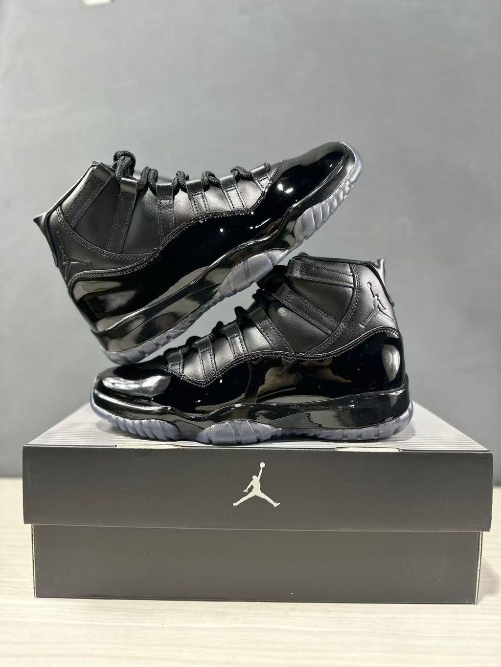 Comme des Garçons × Jordan Air Jordan 11 Sneakers in Black - product image from the listing.