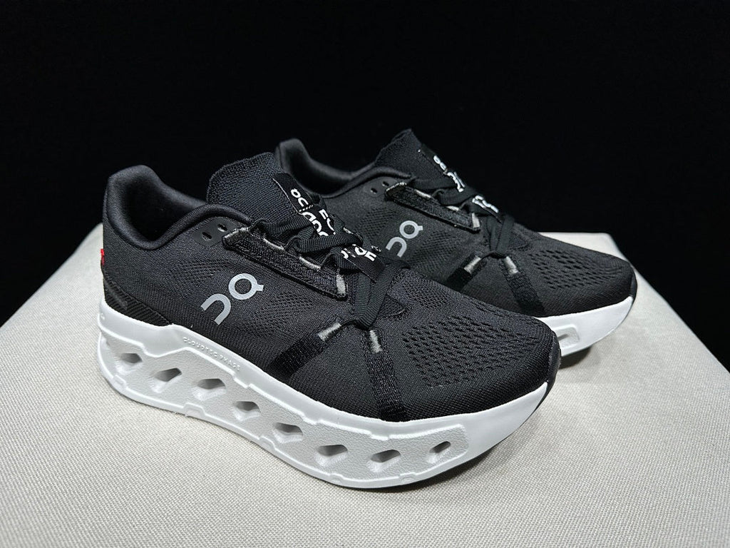 On CloudEclipse Running Shoes in Black and White - product image from the listing.