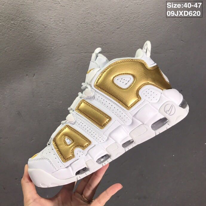 Nike Air More Uptempo Sneakers in White and Metallic Gold - product image from the listing.