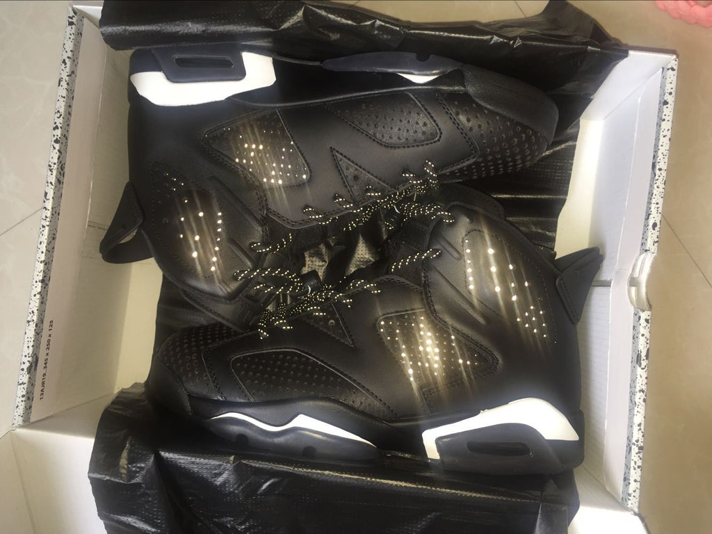 Jordan 6 Retro Black Cat High-Top Sneakers in Black and White - product image from the listing.
