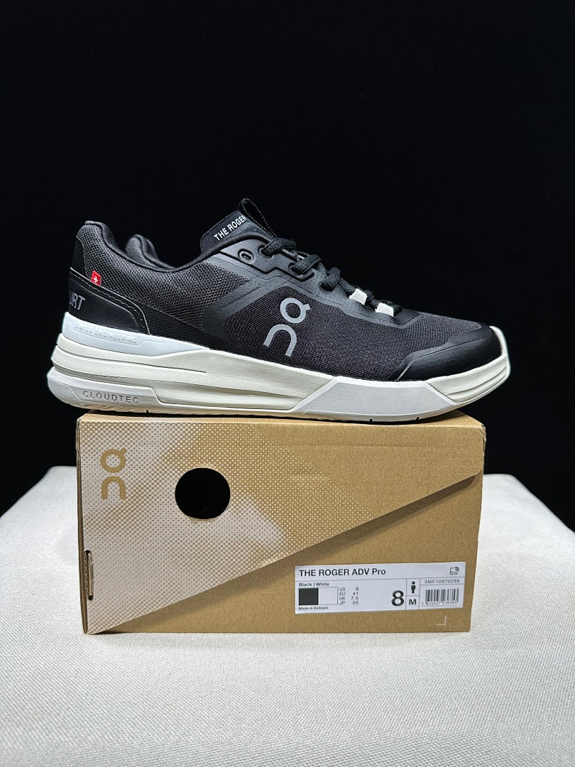 On THE ROGER Clubhouse Pro Tennis Sneakers in Black and White - product image from the listing.