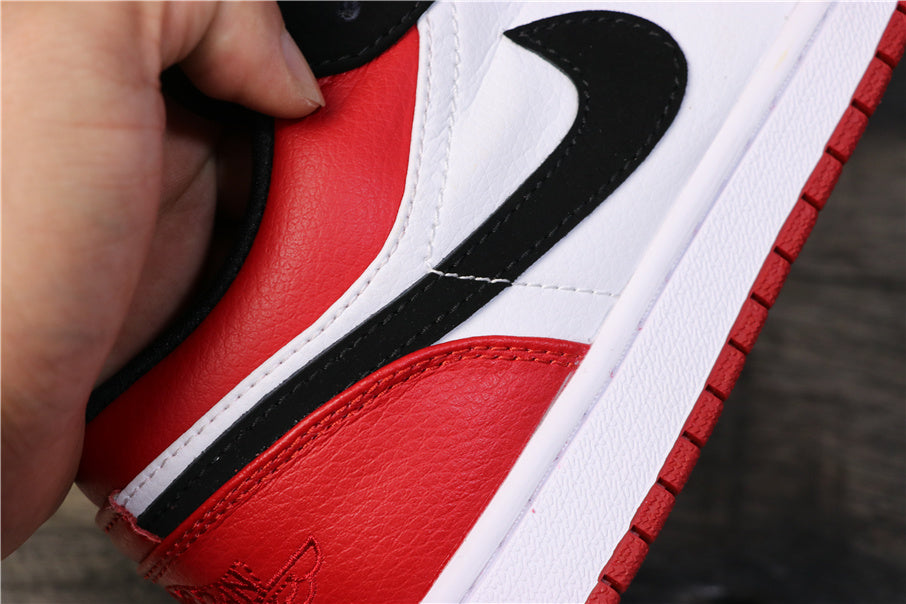 Air Jordan 1 Low Black Toe Red, Sneakers in White and Black - product image from the listing.