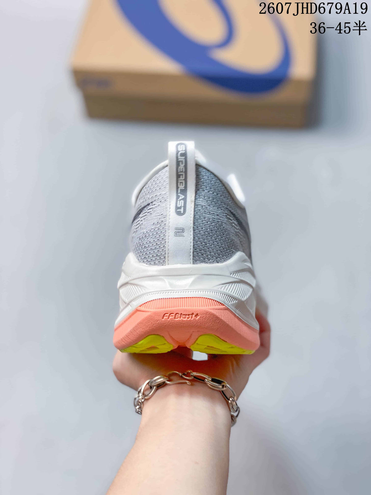ASICS Superblast 2 Paris Running Shoes in Gray White Coral - product image from the listing.