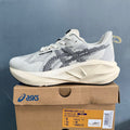 ASICS NOVABLAST 5 LE Running Shoes, in White and Black - product image from the listing.