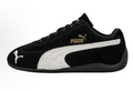 PUMA Low-Top Sneakers in Black and White - product image from the listing.