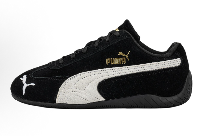 PUMA Low-Top Sneakers in Black and White - product image from the listing.