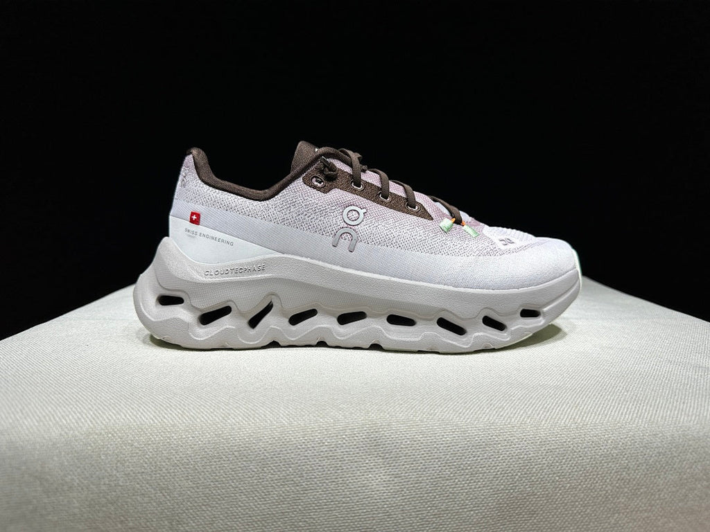 On Cloudtilt Sneakers in Blush in Pink and Pearl White - product image from the listing.