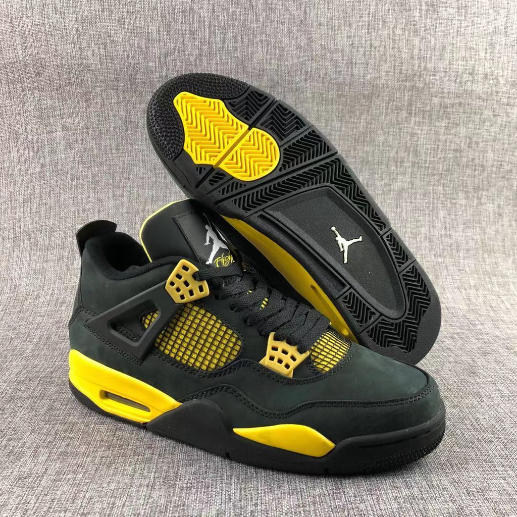Air Jordan 4 Thunder Black Yellow Sneakers - product image from the listing.