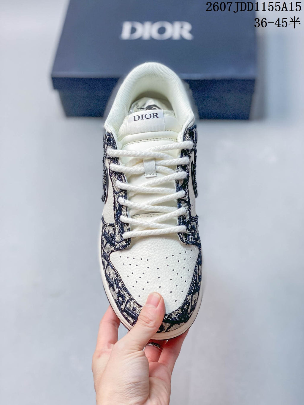 Nike SB Dunk Low White Navy Dior Pattern Trainers - product image from the listing.