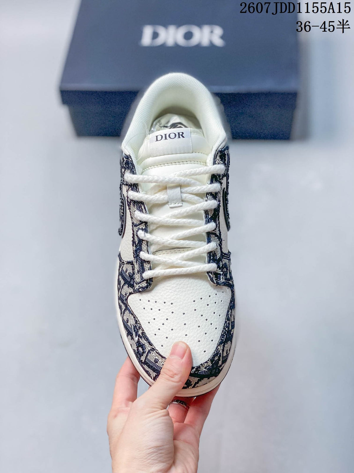 Nike SB Dunk Low White Navy Dior Pattern Trainers - product image from the listing.