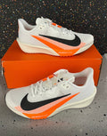 Nike Air Zoom Rival Fly 4 Running Shoes in White Orange FV6040-101 - product image from the listing.