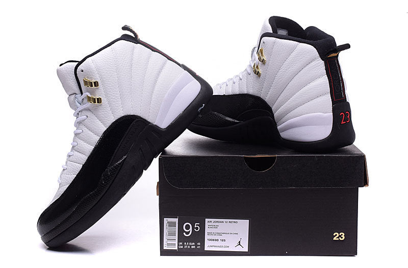 Air Jordan 12 Retro White and Black High-Top Sneakers - product image from the listing.