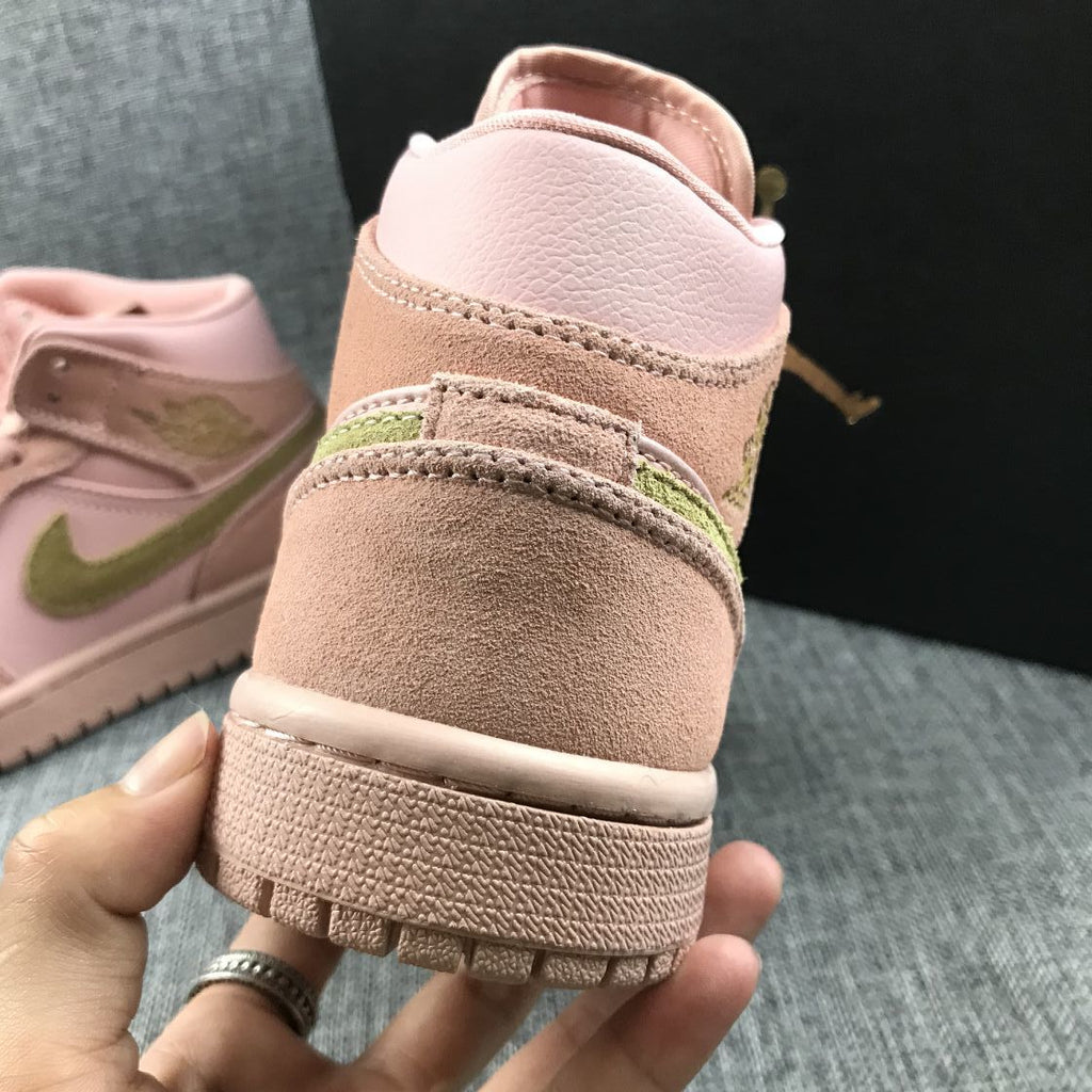 Jordan 1 Mid SE Sneakers in Pink 852542-600 - product image from the listing.